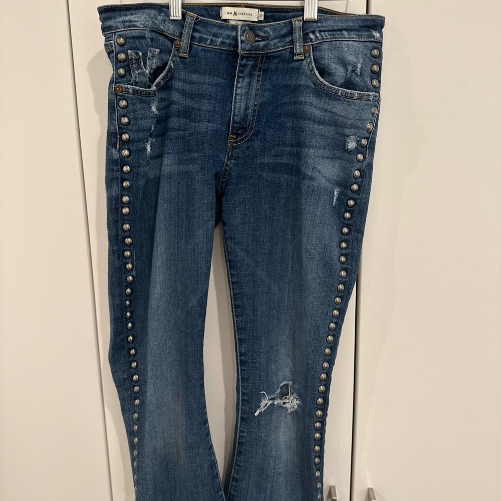 MM Vintage Studded and ripped flare jeans
